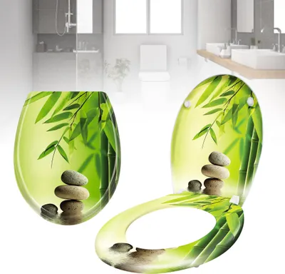A toilet seat and lid with a bamboo and stone design, presented in a bathroom setting.
