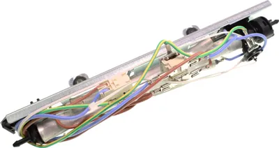 A close-up, angled shot of an electrical component with many wires.