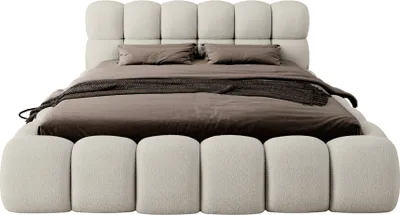 A beige upholstered bed with a headboard and mattress, shown from the front.