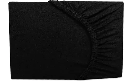 A black fitted sheet is shown folded, with the elasticized edge visible.