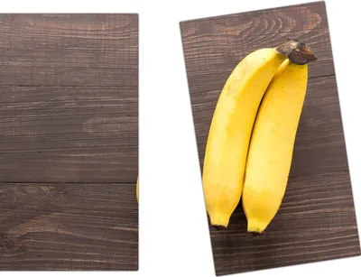 Produktbild von Spritzschutz Herdabdeckplatte Schneidebrett aus Glas Bananen auf Tisch 2-Teilig (60x52cm)
