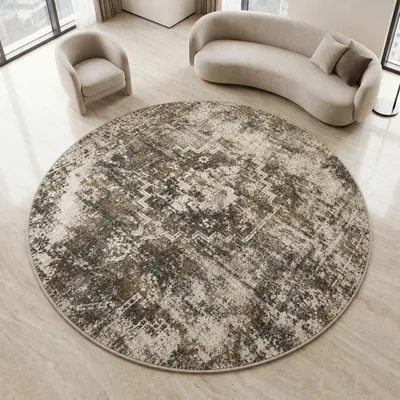 Image de Tapis de sol beige avec motif en médaillon et aspect vintage texturé. Dimensions : 120 cm de diamètre