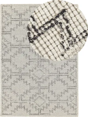 Produktbild von BELIANI Teppich beige / schwarz Wolle 140 x 200 cm geometrisches Muster handgetuftet Boho Wohnzimmer Schlafzimmer