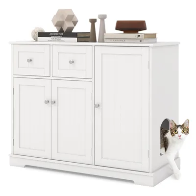 A white cabinet with doors and drawers, designed to conceal a litter box, with a cat peeking out of an opening.