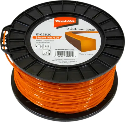 A spool of orange trimmer line on a black spool, with product information printed on the spool.