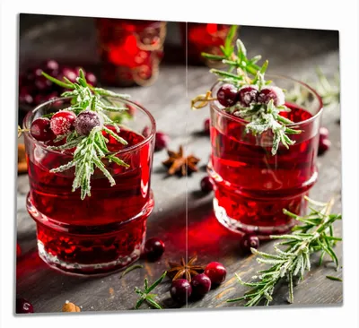 Produktbild von Wallario Herdabdeckplatte aus Glas, Größe 60 x 52 cm 2-teilig, Motiv Winterlicher Cranberry-Punsch mit Rosmarin