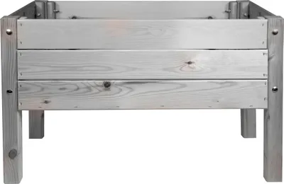 A wooden raised garden bed on a white background.