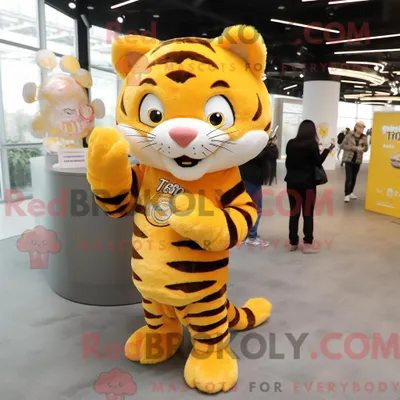 Produktbild von Maskottchenkostüm REDBROKOLY eines gelben Tigers mit Mantel und Broschen