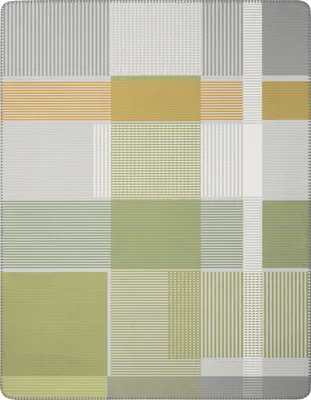 A flat lay of a blanket with a plaid pattern.