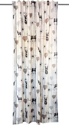 A curtain with a deer and heart pattern.