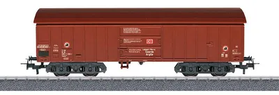 A model train car on a track.