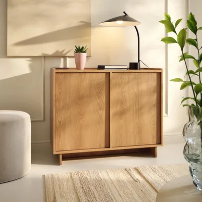 Productafbeelding van Kommode SUNA, 98 cm. Dressoir Karamell Eikenhout, 2 deuren met push-to-open mechanisme, 4 vakken