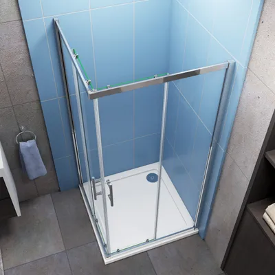 A modern bathroom with a glass shower enclosure.