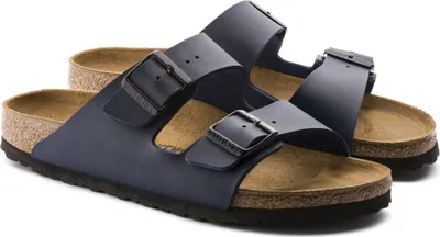 A pair of blue Birkenstock sandals on a white background.