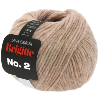 A ball of beige yarn with a black label.