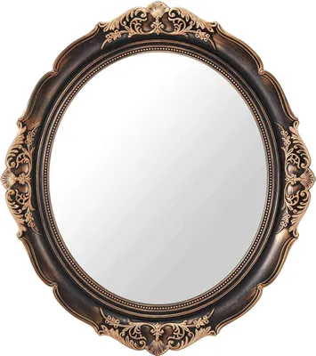 A decorative oval mirror with an ornate frame.