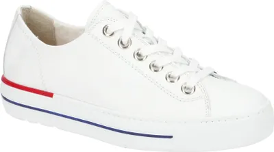 A white leather sneaker with red and blue accents on the sole.