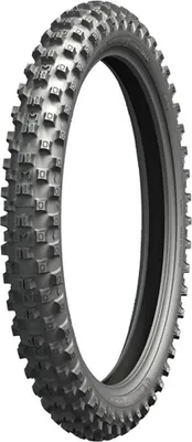 A single motorcycle tire shown against a white background.