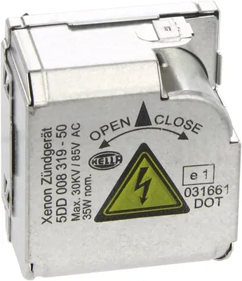 A close-up studio shot of a silver automotive ballast.