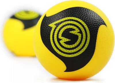 Two yellow balls with black markings, one in focus in the foreground and another blurred in the background.