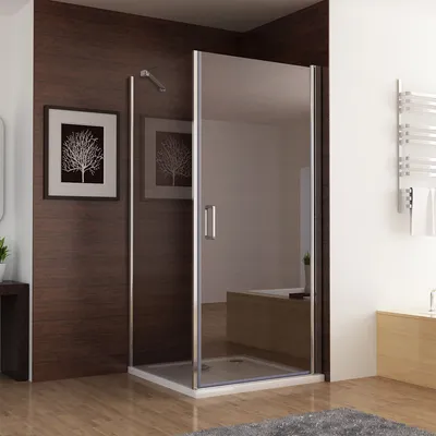 A modern bathroom with a glass shower enclosure.