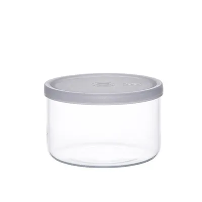 A clear, studio shot of a round glass food storage container with a gray lid, isolated on a white background.