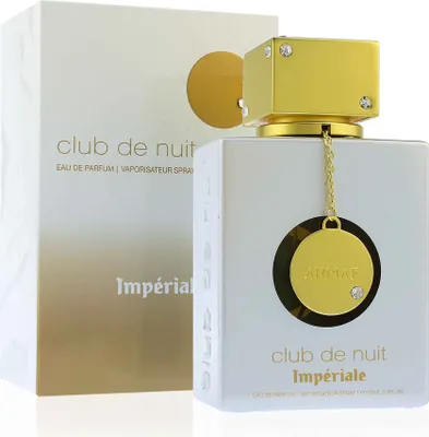 A white perfume bottle and its packaging are displayed against a white background.