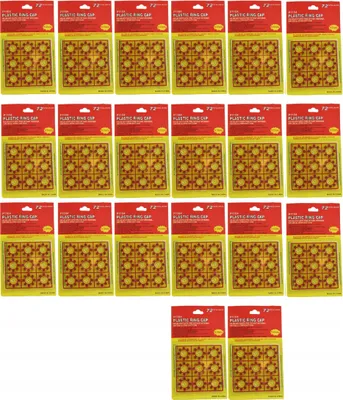 Multiple packages of toy gun caps arranged in rows.