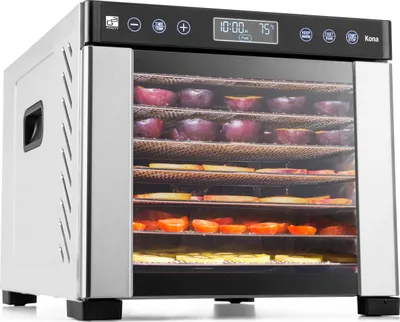 A food dehydrator filled with various fruits and vegetables.