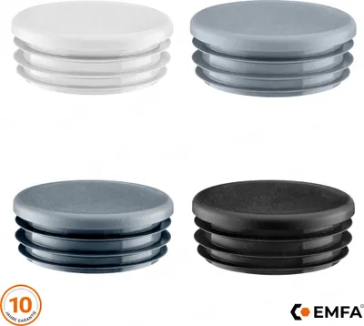 Four different colored round lamella plugs are displayed against a white background.