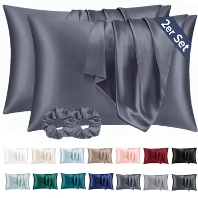 Produktbild von Set mit 2 Satin-Kissenbezügen, 40 x 80 cm, blau-violett, seidenweich und pflegeleichter als Seidenkissenbezüge. Inklusive 2 Haargummis.