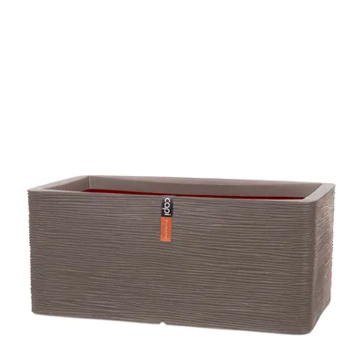 A rectangular planter with a textured surface and a red interior, shown against a white background.