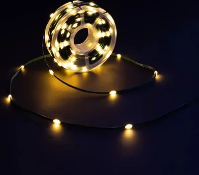 Produktbild von Idena Micro-Lichterkette 200 LED warmweiß Gesamtlänge 22,9m auf Rolle 8h Timer 8 Lichtmodi