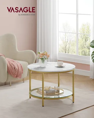 A living room scene with a chair, a coffee table, and a window.