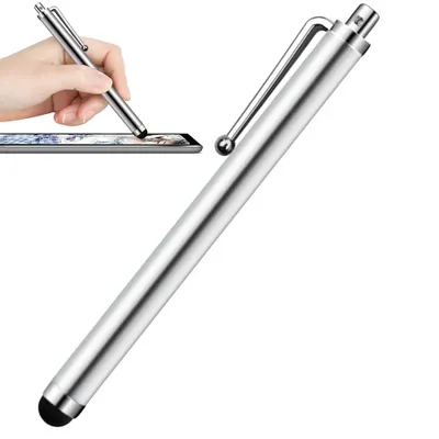 A hand holding a stylus pen over a tablet.