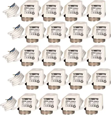 A grid of white thermostatic actuators for underfloor heating systems.