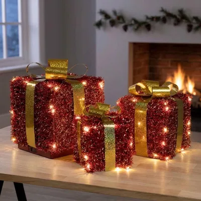Produktbild von LED Geschenkboxen 3er Set rot-gold, beleuchtete Geschenke Weihnachtsdeko mit 76 warmweissen LEDs, Timer, batteriebetrieben, 12/15/18 cm