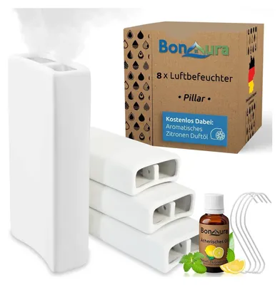 A product shot of a humidifier set with its packaging and accessories.