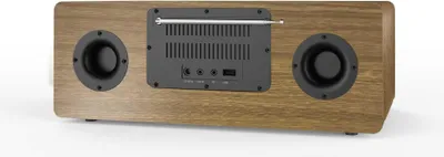 The back view of a wooden radio with speakers and ports.