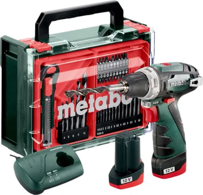 A Metabo PowerMaxx BS Basic Set Akku-Bohrschrauber with its accessories, including a drill bit set, battery, and charger, is displayed against a white background.