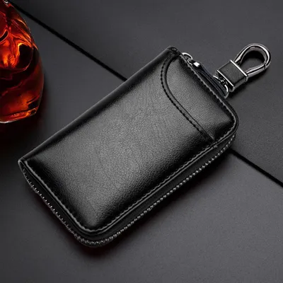 Imagen del producto de Llavero de cuero genuino con cremallera, organizador de llaves, funda para el coche