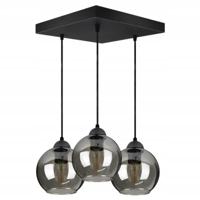 A black pendant light fixture with three smoked glass globes hanging from a rectangular base.