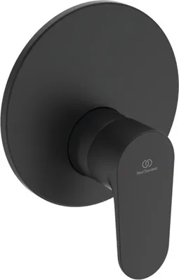 A black shower faucet with a circular backplate and a lever handle.