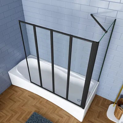 A bathtub with a folding shower screen installed.