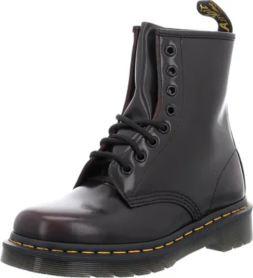 A single Dr. Martens boot is shown against a white background.