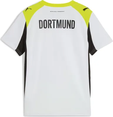 The back of a white Puma Borussia Dortmund children's jersey with yellow and black accents.
