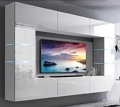 A modern, wall-mounted entertainment unit with a large TV and integrated shelving.
