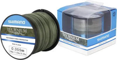 A spool of fishing line and its packaging are shown against a white background.