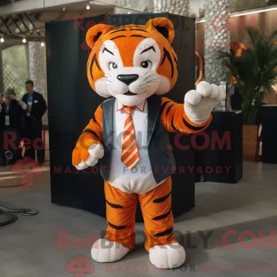Produktbild von Orange REDBROKOLY Tiger Maskottchen Kostüm Charakter gekleidet mit einem Blazer und Fliege
