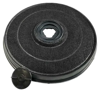A close-up studio shot of a charcoal filter and its cap.